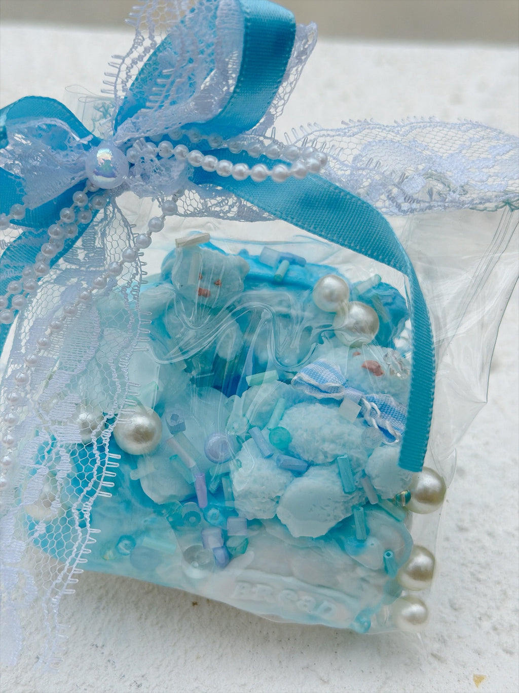 SHADUO SQUISHY Wonder Village Sky Blue Pearl Squishy Bag - Bear style, real product photo