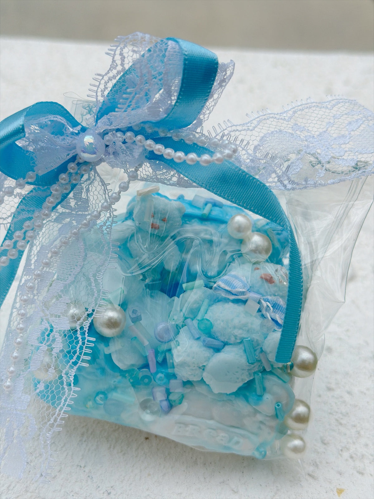 SHADUO SQUISHY Wonder Village Sky Blue Pearl Squishy Bag - Bear style, real product photo