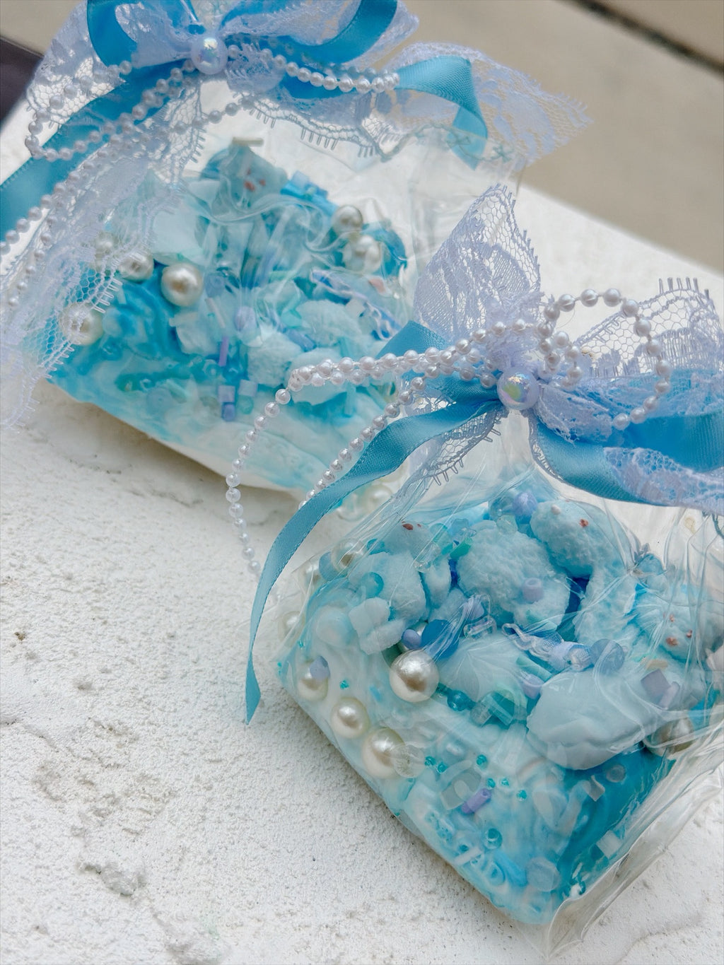 SHADUO SQUISHY Wonder Village Sky Blue Pearl Squishy Bag - Bunny and Bear styles side by side, real product photo