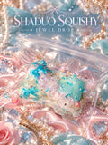 Jewel Drop blue bow squishy, AI cover