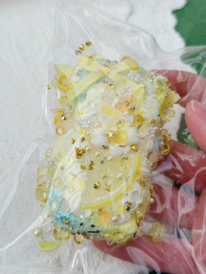 SHADUO SQUISHY Jewel Drop Lemon Cream Cake Squishy squeeze demo - watch it squish and slowly rebound
