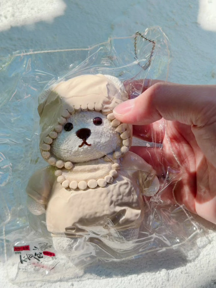Squeezing the Wonder Village hooded bear squishy