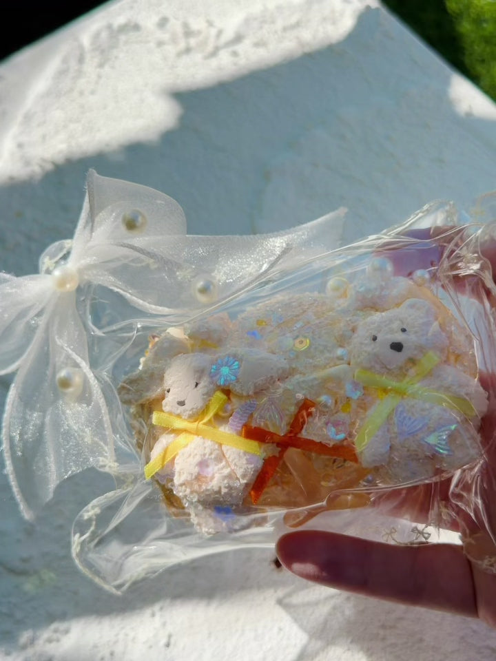 Squeezing the Wonder Village bear starfish squishy