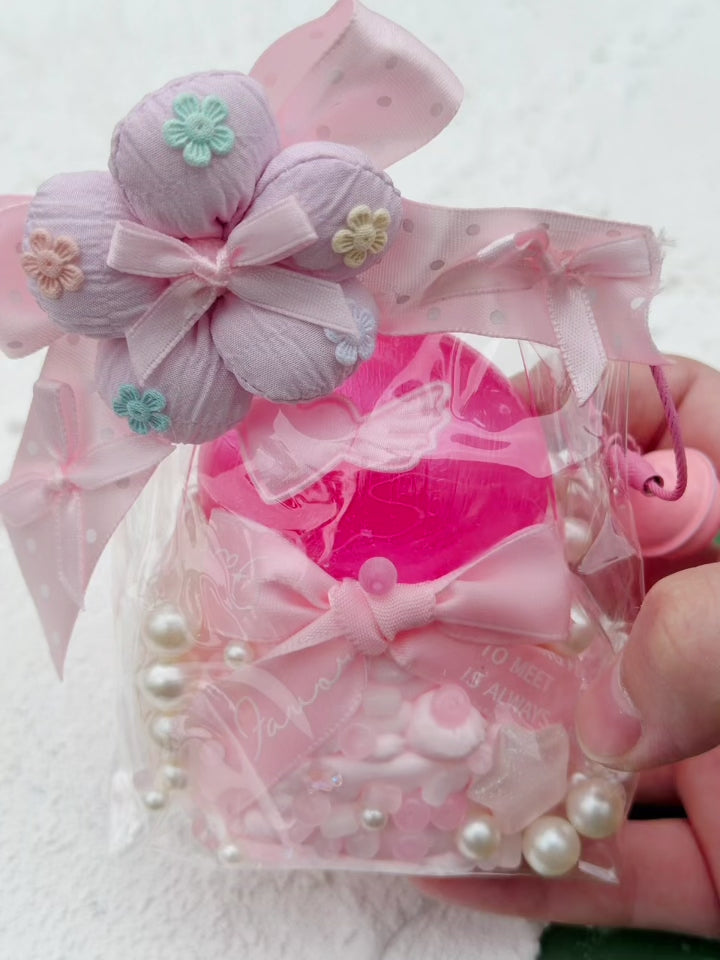 SHADUO SQUISHY Wonder Village Pink Blossom Squishy Bag squeeze demo - watch it squish and slowly rebound