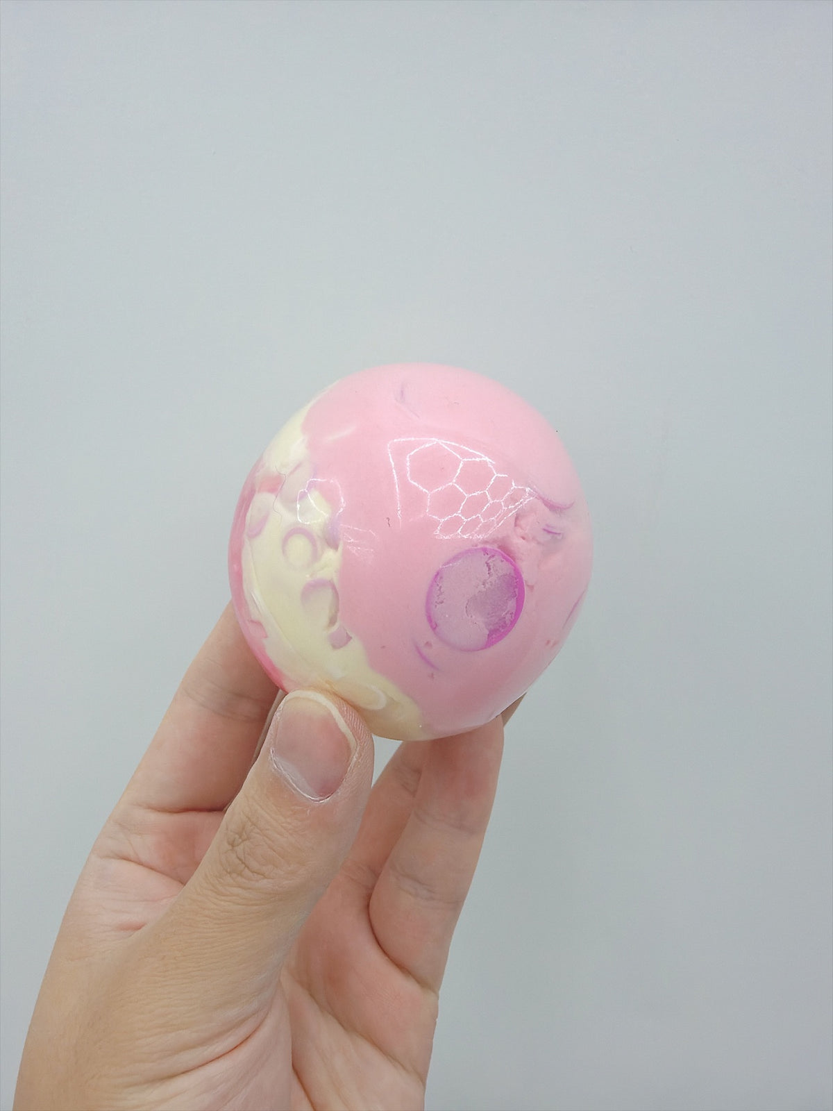 Real Touch Me crunchy crystal & glossy ball squishy, marbled side in hand