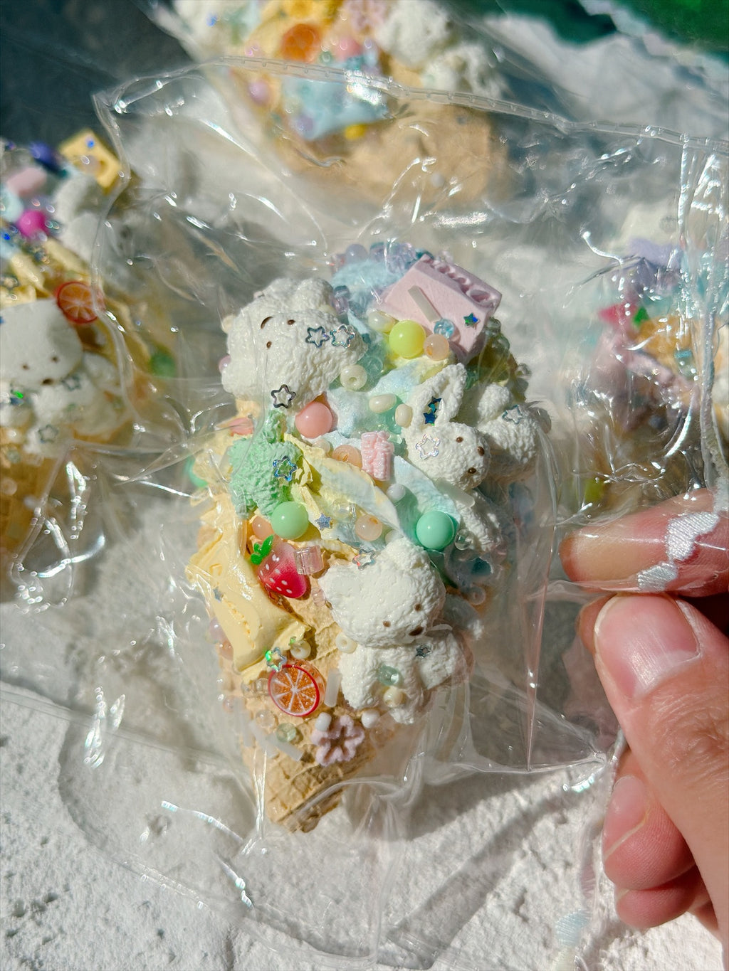 Wonder Village ice cream cone squishy with bunny and bear figures, pastel beads and charms, in a clear bag