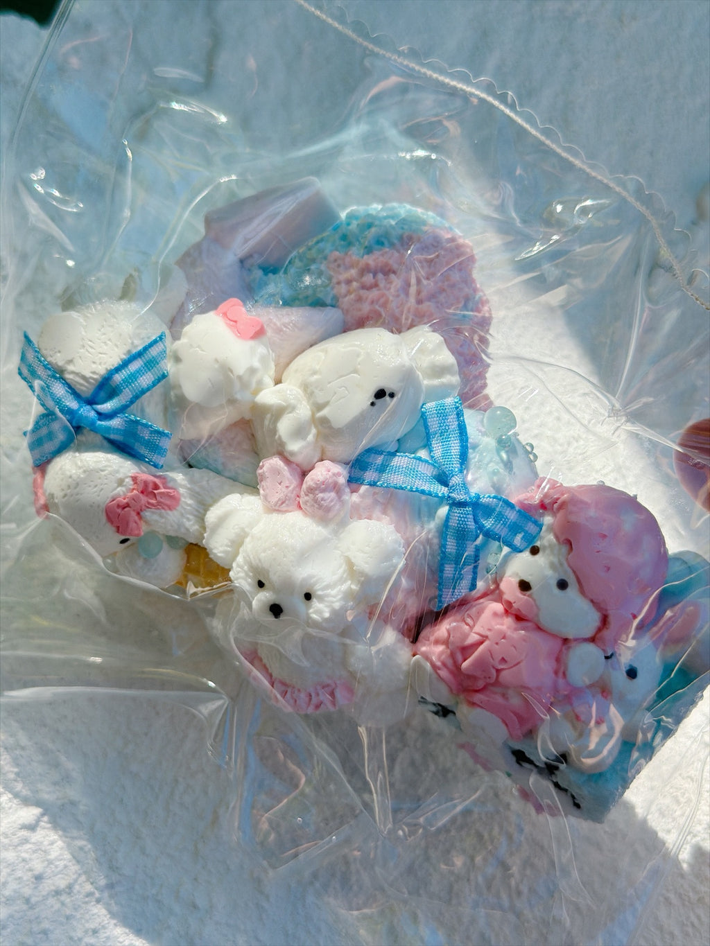 Wonder Village blue bow squishy bag, close-up