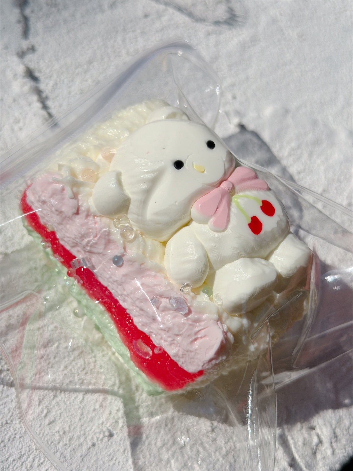 Wonder Village cherry bunny cake squishy, side view